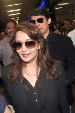 Madhuri dixit snapped with husband in Mumbai Airport on 6th April 2012 (27).jpg